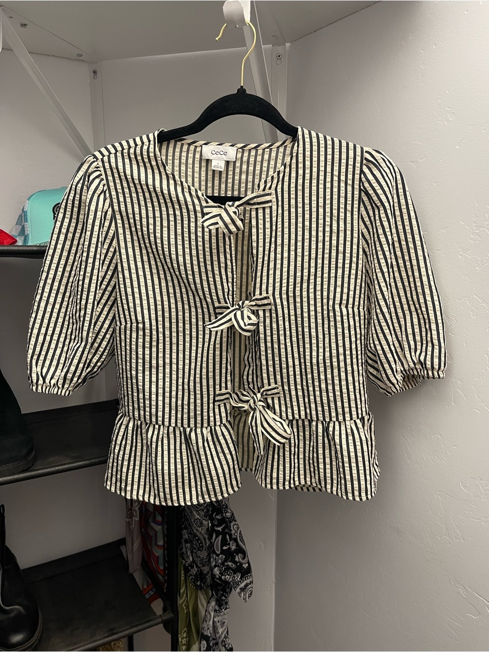CeCe Black & cream Striped Tie-Front Peplum Top with puff sleeves